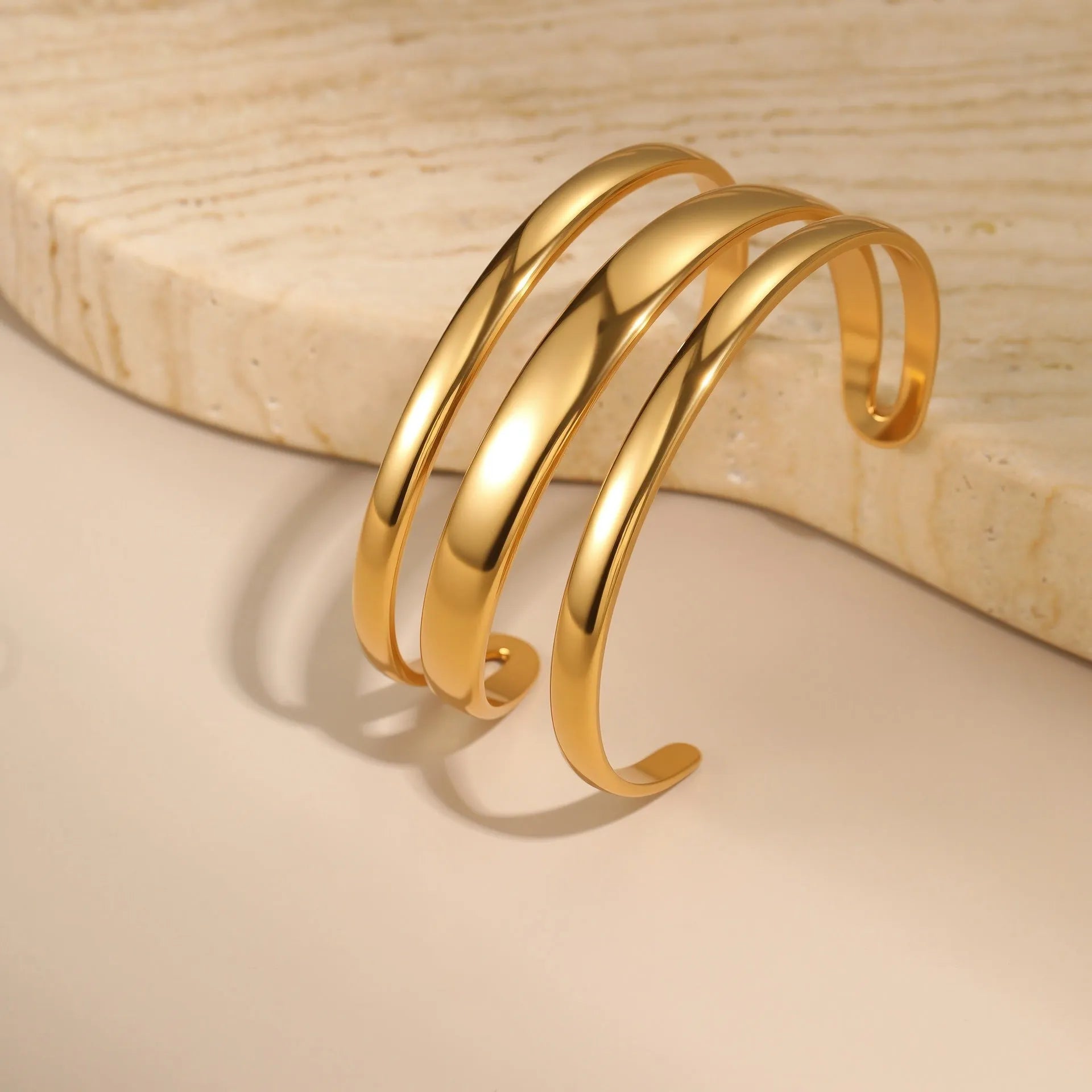 Geometric stainless steel bracelet with simple opening design and 18K gold electroplating