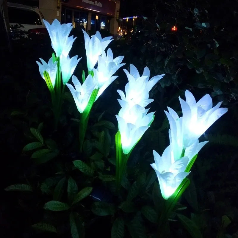 Colourful solar-powered LED lawn lamp in a flower shape for garden decoration.