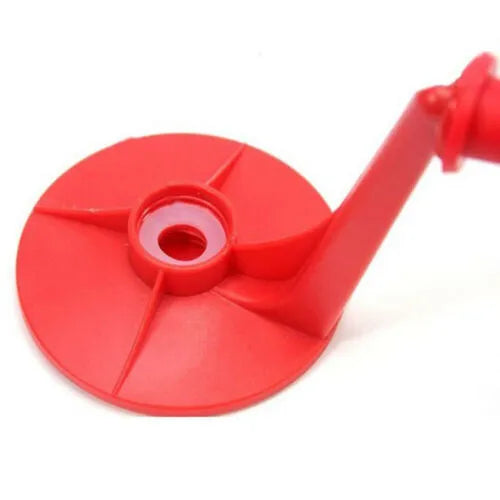 Red ABS plastic soft drink dispenser mounted on inverted beverage bottle