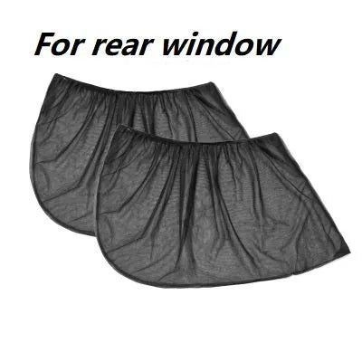 Elastic car side window sunshade made of grey mesh, stretched over a car window frame.