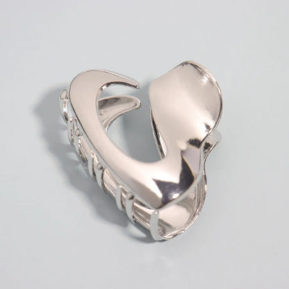 Silver metal hair claw barrette example from a range of 44 Korean-style designs.