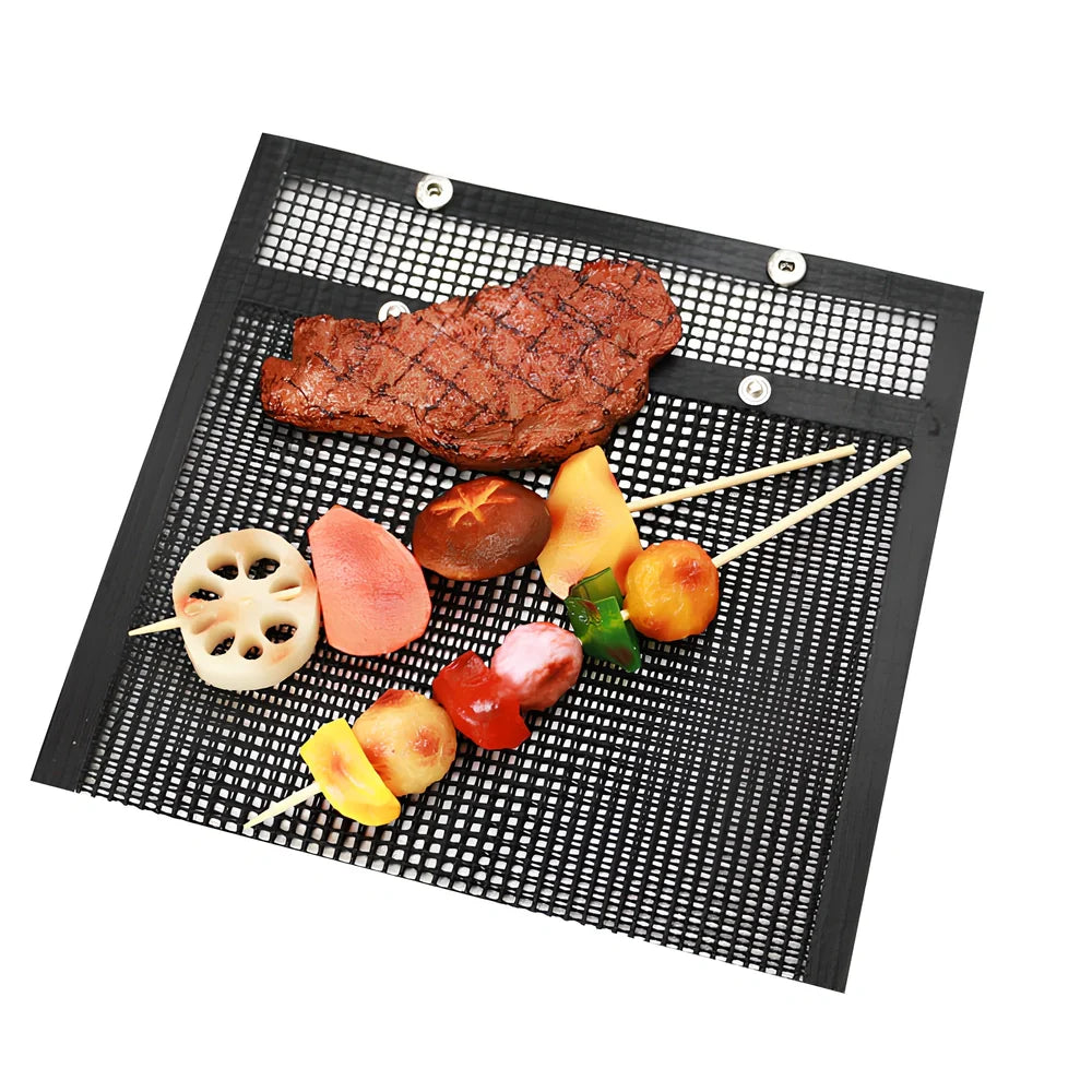 Black grill mesh bag with non-stick grid mat for BBQ cooking showing smoke-through design