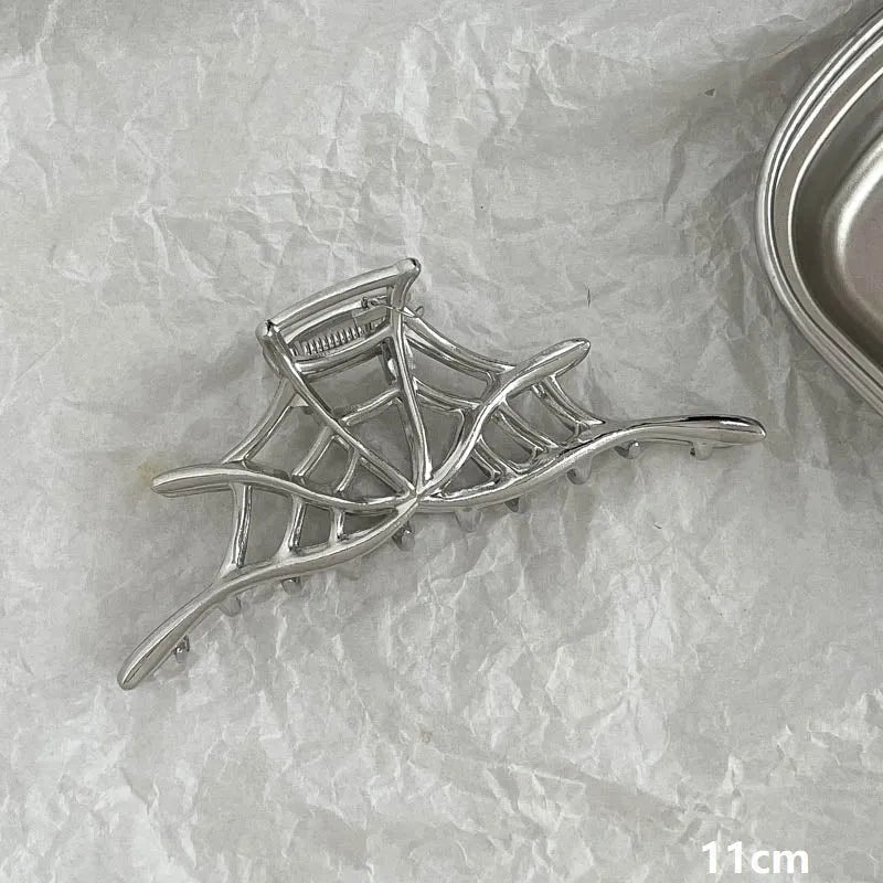Silver metal hair claw barrette example from a range of 44 Korean-style designs.