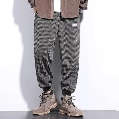 Men's grey ankle-tied sweatpants with straight leg cut and non-ironing fabric