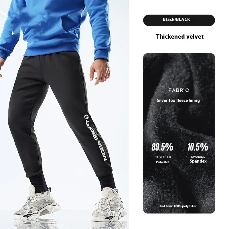 Men's black ankle-tied sweatpants with mid waist and adjustable ankle tie on hanger