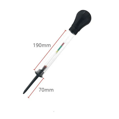 A red and black glass electrohydraulic hydrometer for testing car battery electrolyte density.
