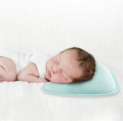 Sunveno Baby Pillow in blue, pink, or white with corn fiber core for head shaping