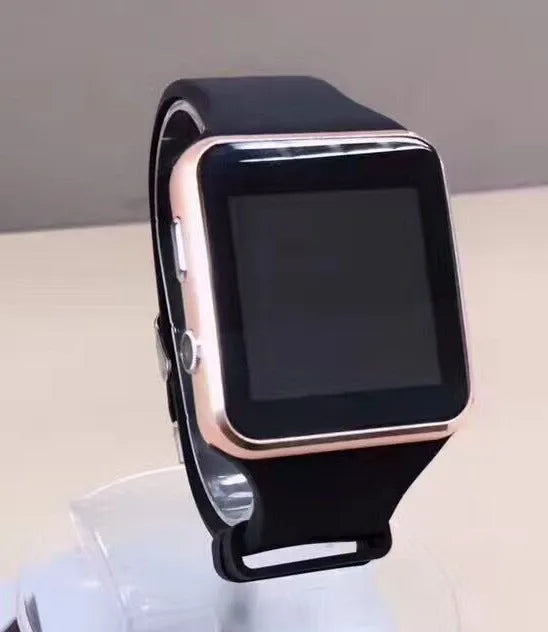 Black smart watch with 1.54-inch touchscreen display and silicone strap on a wrist