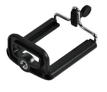Black mini camera tripod with extended legs and a separate U-shaped universal phone clip on a table.
