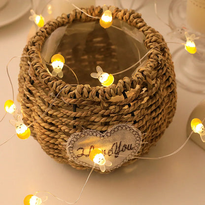 Easter LED bunny string lights with carrot and transparent white rabbit shapes on flexible copper wire