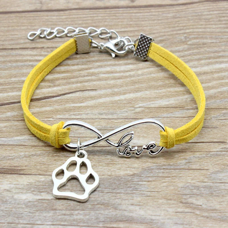 Stylish hand-woven infinite love pet bracelet in various colours, featuring a bow design and made of premium alloy materials