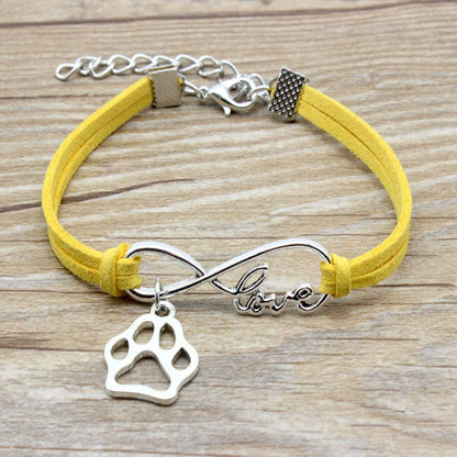 Stylish hand-woven infinite love pet bracelet in various colours, featuring a bow design and made of premium alloy materials