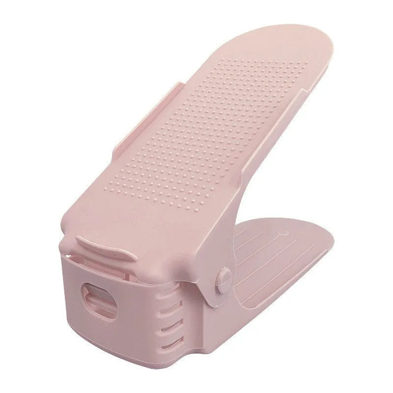 A stackable plastic shoe storage cabinet with two open shelves, shown in a choice of colours.