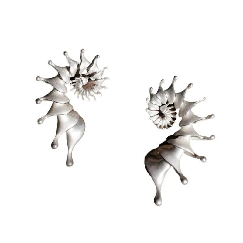 Matte finish conch shell stud earrings with three-dimensional design in alloy metal
