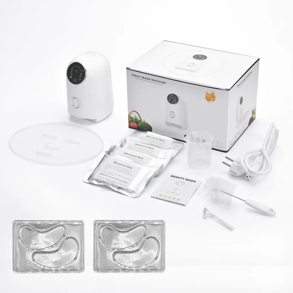 White plastic homemade face mask maker with tray, scraper, measuring cup, 32 effervescent tablets, and power cord.