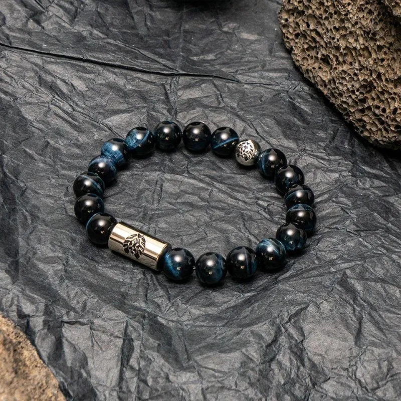 Little Lion ethnic geometric bracelet made from brown Bodhi seed beads on a wrist.