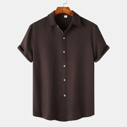 Men's casual short-sleeved cardigan shirt in polyester fabric showing colour options and relaxed fit