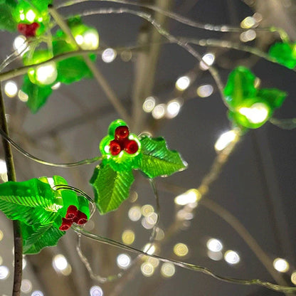 Copper wire LED Christmas decoration lights featuring festive designs like bells, trees, and elks