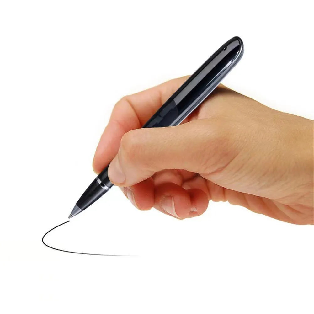 Black lossless audio recording pen with OLED display screen on a desk next to headphones.