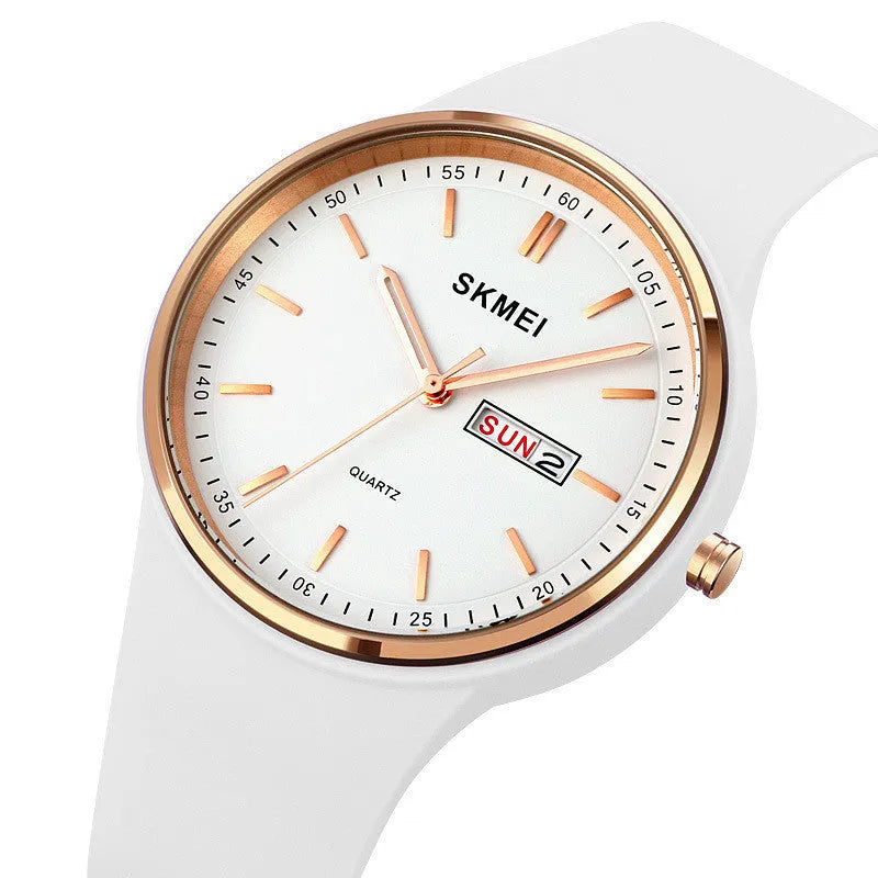 Women's quartz watch with a silicone strap and calendar on a 42mm white dial.
