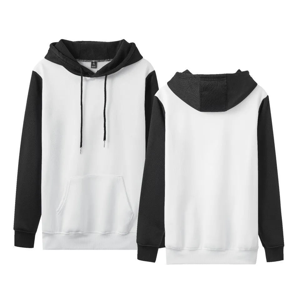 Man wearing a white loose fleece-lined hoodie with contrast stitching, showing the pullover style and hood.