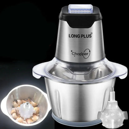 White electric garlic peeler appliance with stainless steel bowl and clear plastic lid on a kitchen counter.