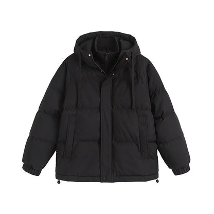 Loose winter cotton-padded coat in mustard yellow with side pockets and cardigan style