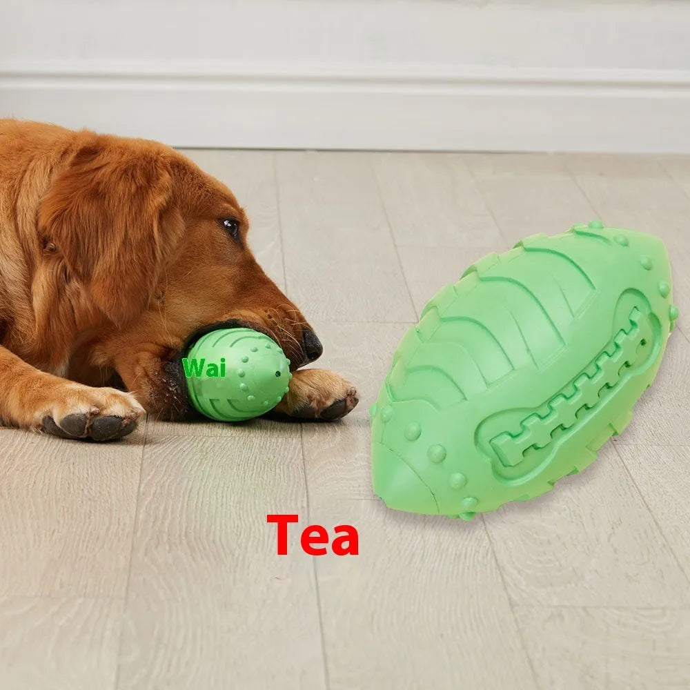 A light green thickened rubber rugby ball dog chew toy on a plain background.