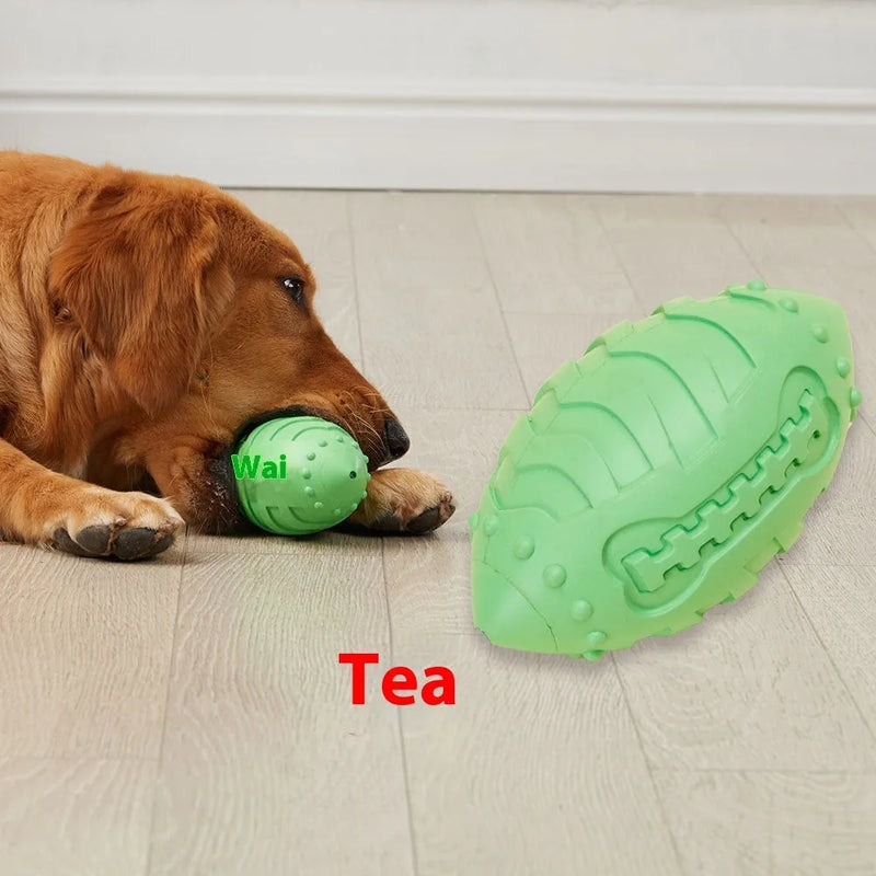 Interactive dog toy featuring a bite-resistant rubber rugby ball shape designed for canine dental cleaning and vocalisation training, available in light green and sapphire blue, with a thickened construction weighing 205g for durable play sessions.