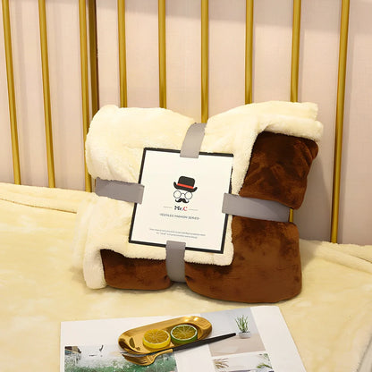 Double-layer flannel blanket showing coffee colour with widened hem detail and dual-surface texture