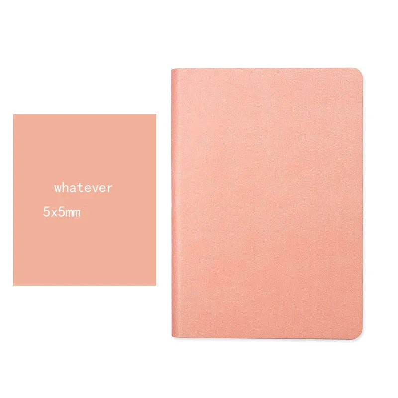 Blue soft imitation leather A5 dotted notebook open on dot grid pages.