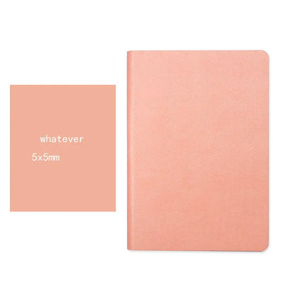 Blue soft imitation leather A5 dotted notebook open on dot grid pages.