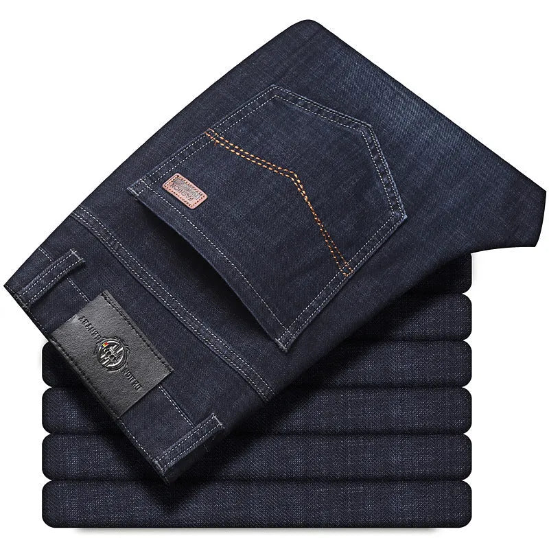 Men's straight-leg stretch jeans in black or blue denim with a zip fly, shown laid flat.
