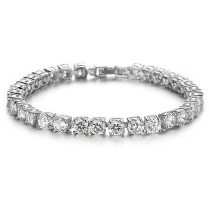 Men's silver alloy link bracelet with a row of clear rhinestones, shown on a wrist.