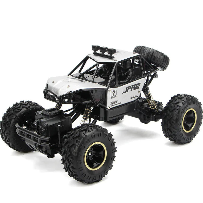 Four-wheel drive remote control car with 2.4G wireless controller on rough terrain