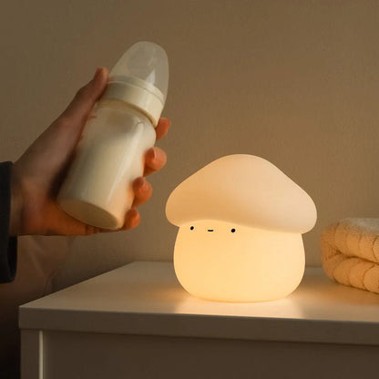Adorable mushroom-shaped night light with warm yellow glow, perfect for children's bedrooms