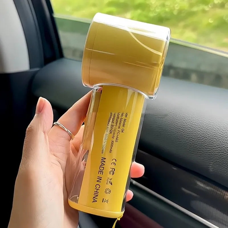 Small handheld refrigeration fan with ice compress function in black, white, or yellow colour.