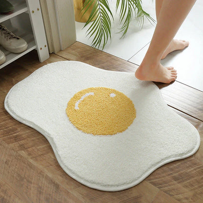 Stylish and absorbent egg-shaped doormat in various sizes and colors, made of plush polyester with a non-slip rubber backing