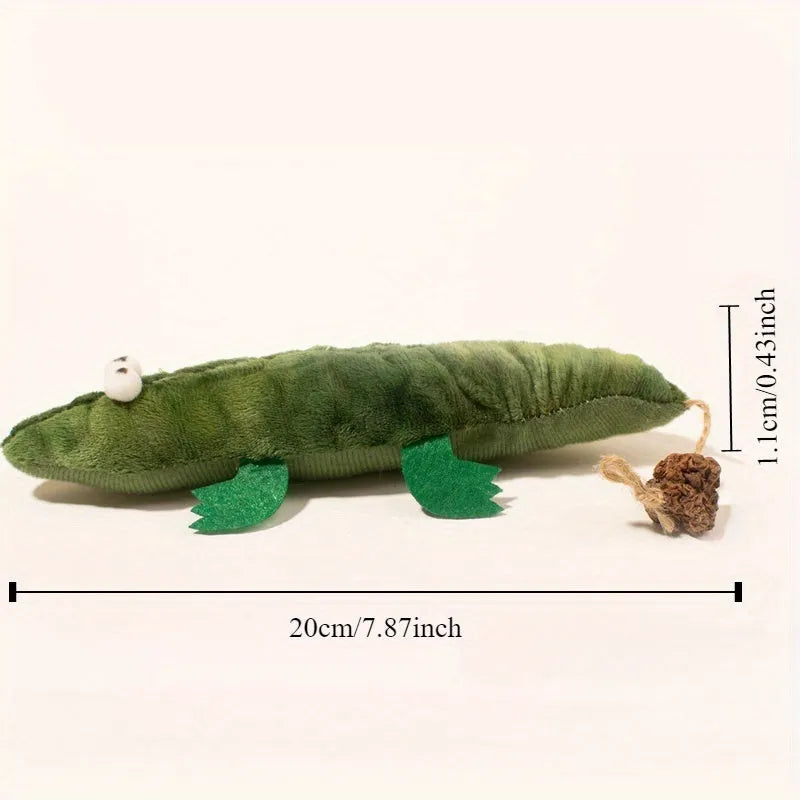 Green fabric plush alligator cat toy with catnip and peppermint scent for oral care.