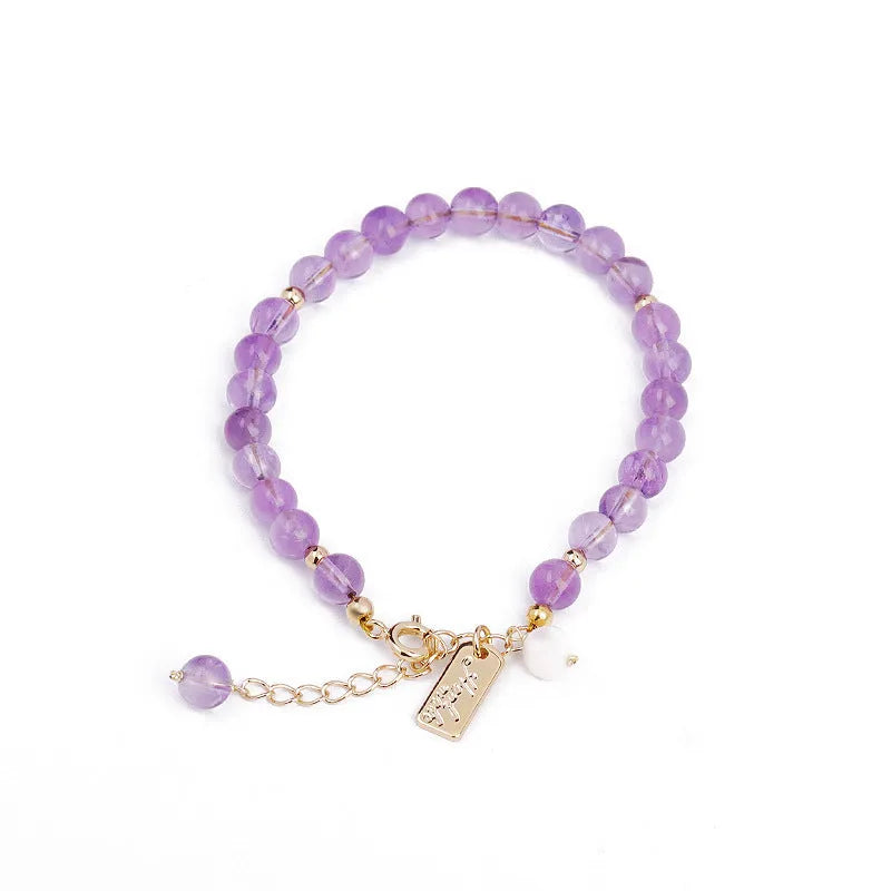 Women's natural lavender amethyst crystal bracelet in elegant design on wrist