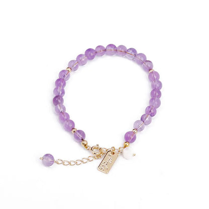 Women's natural lavender amethyst crystal bracelet in elegant design on wrist