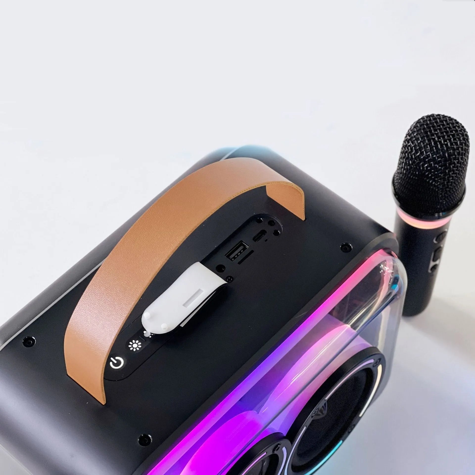 Light yellow portable Bluetooth karaoke speaker with wireless microphone and colourful RGB lights.