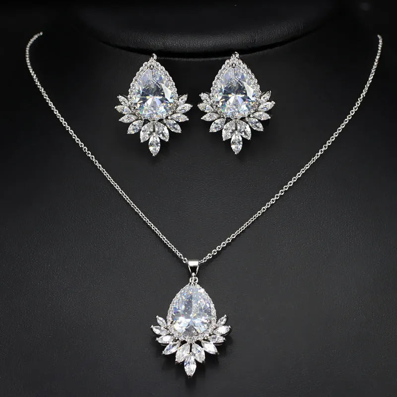 AAA jewellery chain necklace and earrings set for bridal banquets, dinner parties and special occasions, crafted from zinc alloy base metal with crystal stone embellishments in blue, red or white colour options.