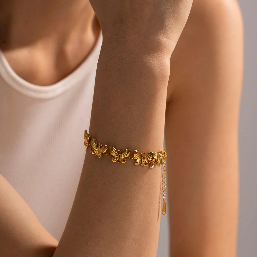 Elegant stainless steel bracelet with delicate butterfly design, available in a variety of fashionable colours