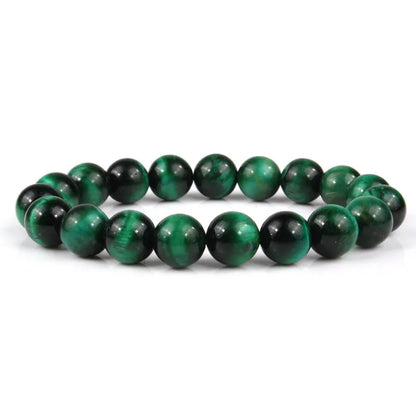 Natural tiger eye crystal bead bracelet showing round geometric beads on a wrist, available in multiple sizes and colour variations.