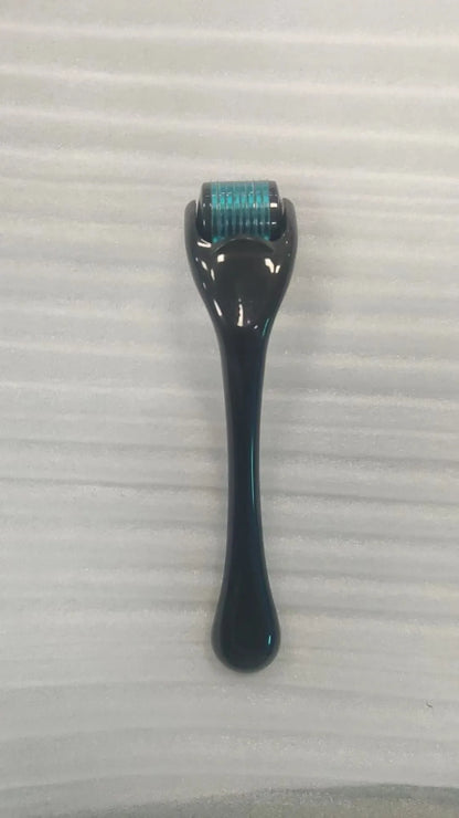 Sterile micro needle derma roller with black handle and coloured wheel on white background