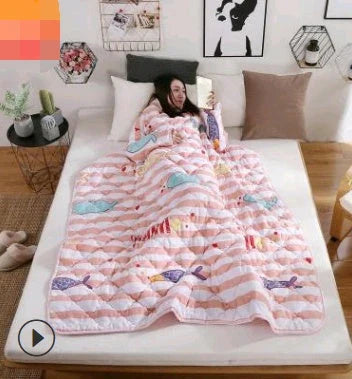 Cozy heated blanket with sleeves for comfortable lounging and hands-free relaxation