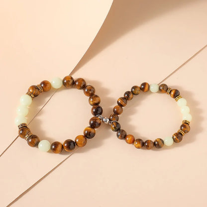 Amber couple bracelet set with geometric patterns in retro style