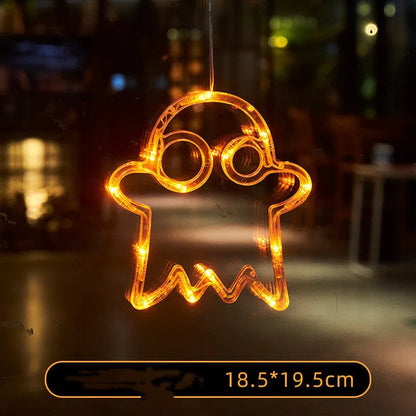 Halloween window hanging LED lights set with spider, pumpkin, and ghost designs for battery-powered holiday decorations