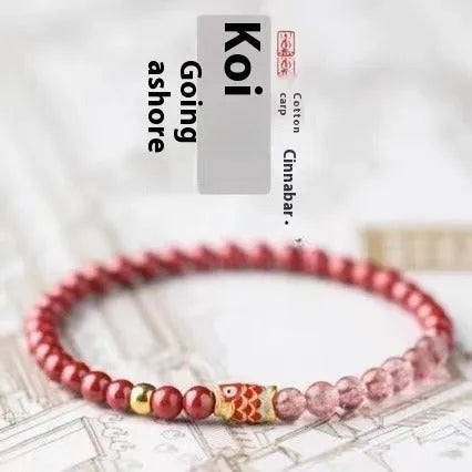 Purple cinnabar and strawberry quartz bracelet with peach blossom and koi beads measuring 19 cm